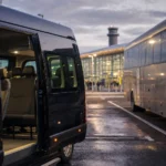 Executive minibus and coach parked at Heathrow Airport showing size difference for group hire